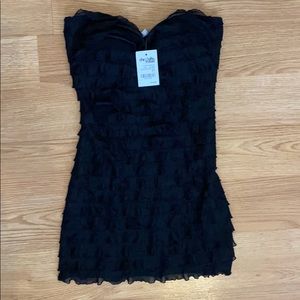 Black ruffled strapless top